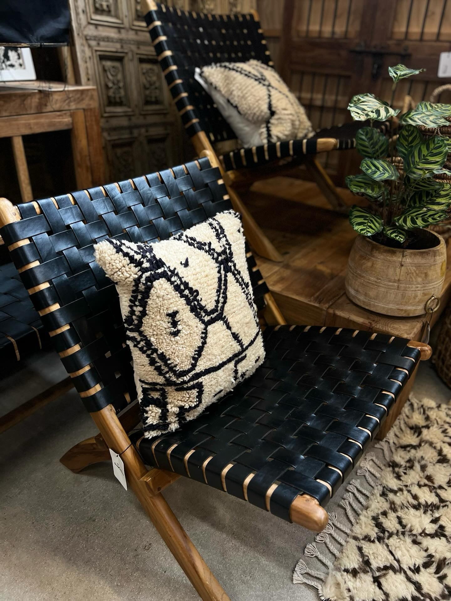 Woven fold-up chair crafted from genuine leather
