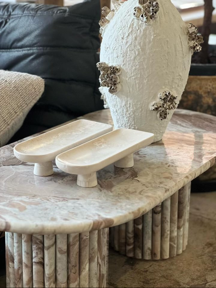 Coffee table featuring a marble pillar base